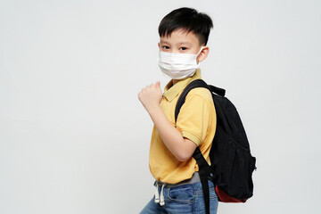 Portrait of young boy wearing face mask