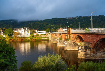 Scenic view of ancient Roman bridge illuminated by sun, Trier, Rhineland-Palatinate, Germany