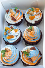 Tricolor cream cupcakes in a white package