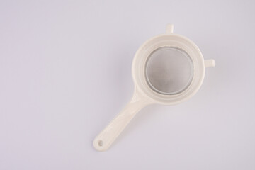 Plastic sieve isolate in white background.