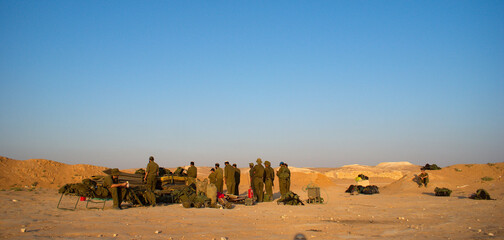 Israeli soldiers excersice in a desert