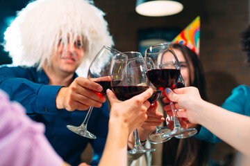 Party at a restaurant. Friends have fun in a restaurant and drink wine. festive mood.