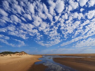Fototapeta na wymiar Dramatic cloud scape over an estuary