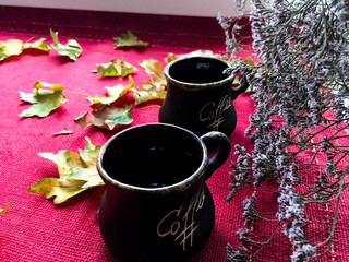 cup of coffee with leaves