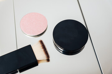 Eye shadow with makeup brushes close up