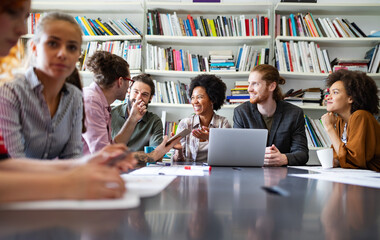 Programmers cooperating brainstorming at information technology company
