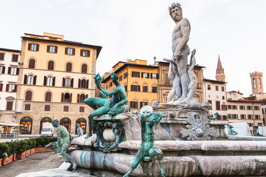 FLORENCE, ITALY - NOVEMBER 4, 2016: statues of Fountain of Neptune on Piazza della Signoria in Florence city in morning. Fointain was built in1565 by sculptor Bartolomeo Ammannati
