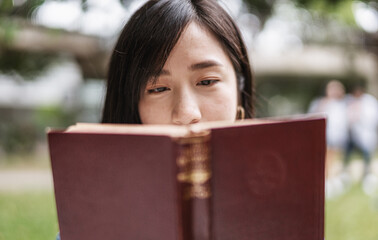 Close-up Young woman reading book