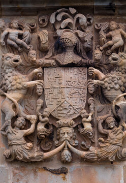 Shield carved in stone with the arms of Miera, Rubalcaba, Velasco, Riba and Ag&uuml;ero. Facade of Miera-Rubalcaba in the town of Rubalcaba, Li&eacute;rganes, Valles Pasiegos, Cantabria, Spain