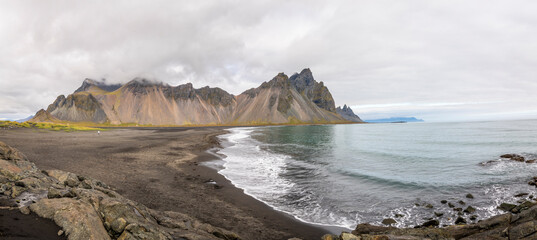 Vesturhorn Mountain and black sand dunes, Iceland.