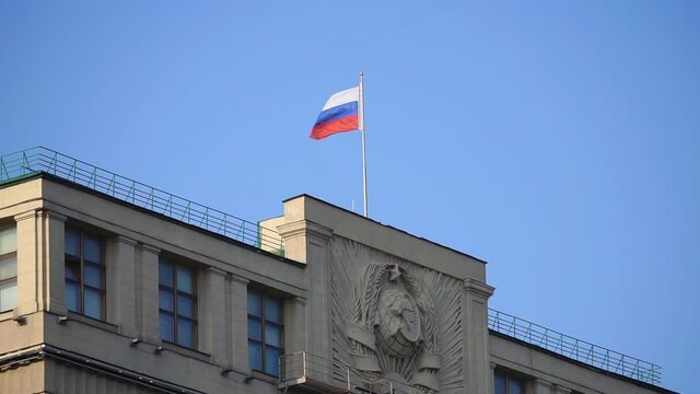 Russian flag by the State Duma in Moscow. Russian politics concept.