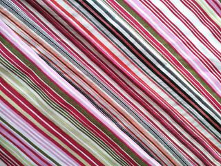 Striped diagonal fabric with geometric pattern. Abstract background.
