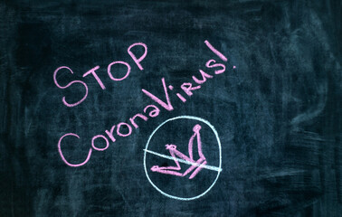 The inscription on the blackboard "Stop coronavirus"