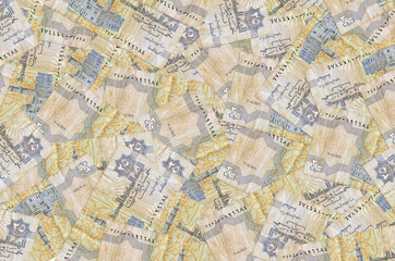 25 Egyptian piastres bills lies in big pile. Rich life conceptual background