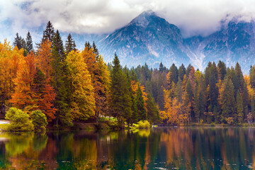 Reflection in the green smooth water