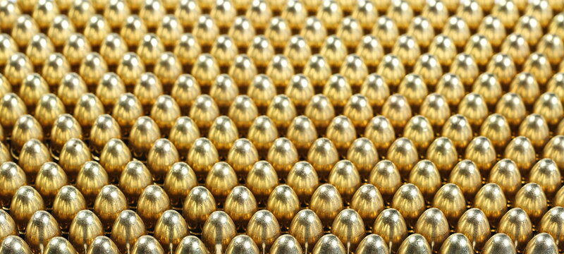 9mm pistol bullets surface background and texture