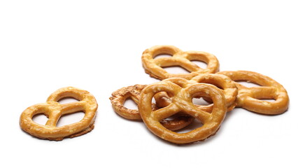 Salty cracker pretzels, party snacks isolated on white background