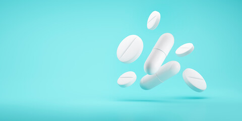 White Pills on blue background - 3D illustration