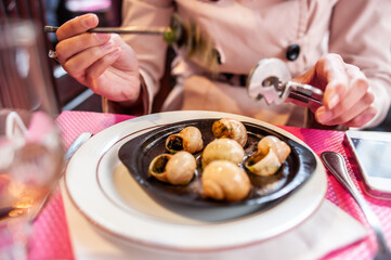 Obraz na płótnie Canvas Snails with garlic sauce in a gourmet French restaurant