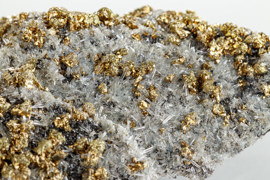 macro stone mineral Quartz pyrite on a white background