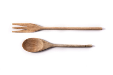 Wooden spoon and fork isolated on white background
