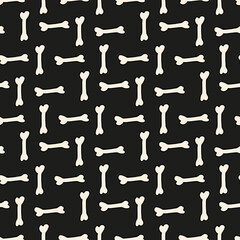 Seamless pattern with bones on black background. Vector image.
