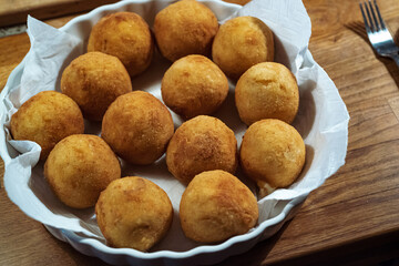 Breaded rice balls, also called arancini or supplì in Italian cuisine