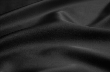 Fototapeta premium Black fabric silk texture for background