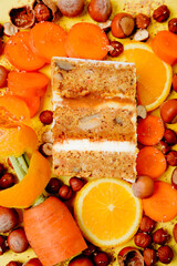 Slice of cake in the section on the background of fruit