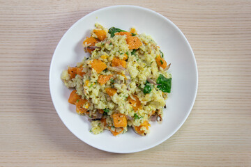 A plate of vegetable risotto.
