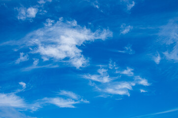 White clouds in blue sky.