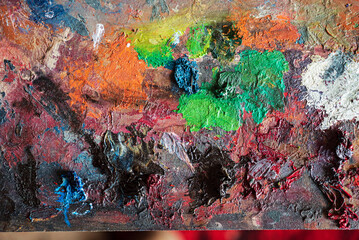 closeup of art palette with colorful paint