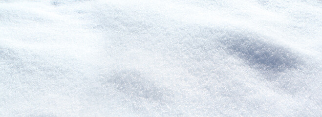 Obraz premium photo of defocused white snow, natural texture, shiny background for designer, concept of winter mood, weather