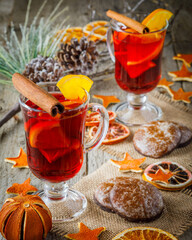 Fototapeta na wymiar christmas cookies and mulled wine on wooden background