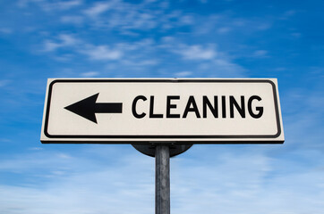Cleaning road sign, arrow on blue sky background. One way blank road sign with copy space. Arrow on a pole pointing in one direction.