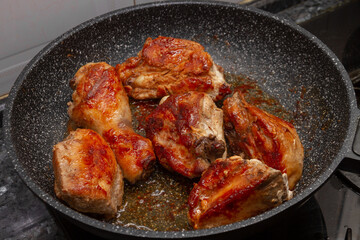 Fried Chicken Cooking in an pan closeup