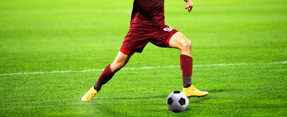 soccer game background player kicking football