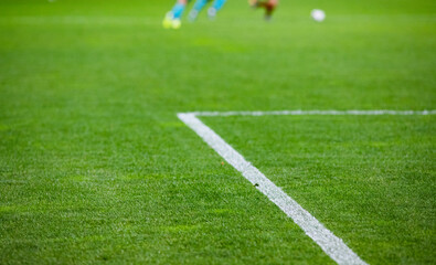blurred background of soccer game on an empty stadium