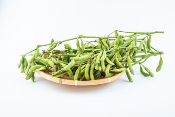 Fototapeta premium Fresh edamame on white background