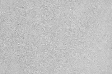 Fototapeta na wymiar Texture of gray plaster. Interior of a modern loft. Abstract rough background. The facade of an old house.