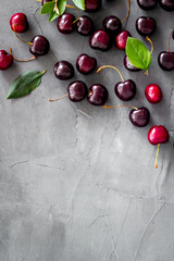Red sweet cherry texture or wallpaper. Flat lay of berries, top view