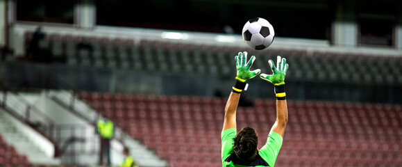 soccer game background goalkeeper catching football