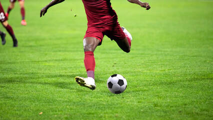 soccer game background player kicking football