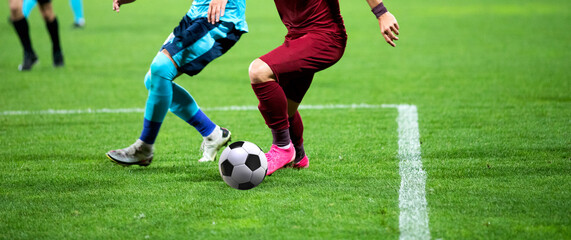 Obraz na płótnie Canvas soccer game background player kicking football