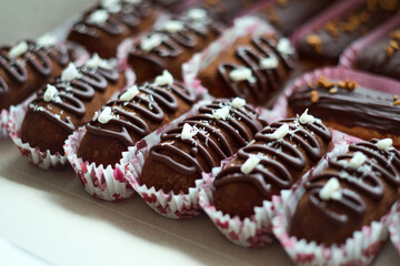 Traditional Russian biscuit cake potato - kartoshka - cake and cream rolled into small potato shape cakes, and then dipped in chocolate coating