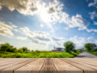 Showcase the old wooden table shelf on the beautiful natural scenery and blurred natural background.