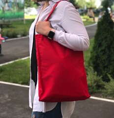 woman with red bag