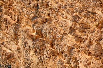 Limestone mountain texture in beige colour. Natural stone materi