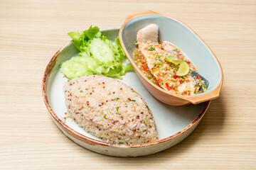 quinoa fried rice with steamed salmon in lime chilli dressing