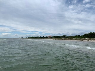 beach and sea on a cloudy day